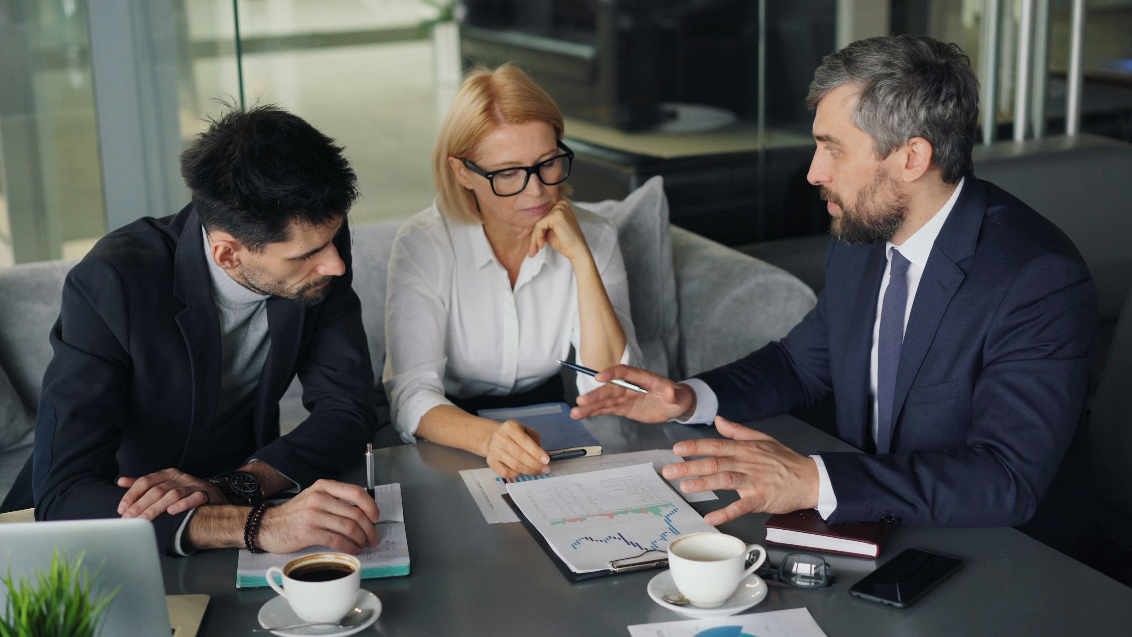 Finance advisor meeting with clients
